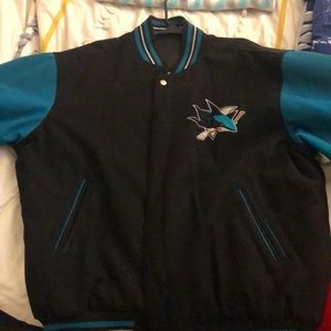 Black reversible San Jose Sharks coat by JH collectibles , still like new